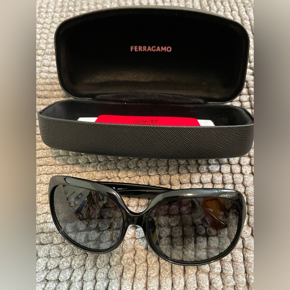 **SOLDFerragamo Marchon Black Square sunglasses can be unisex NWB never used.